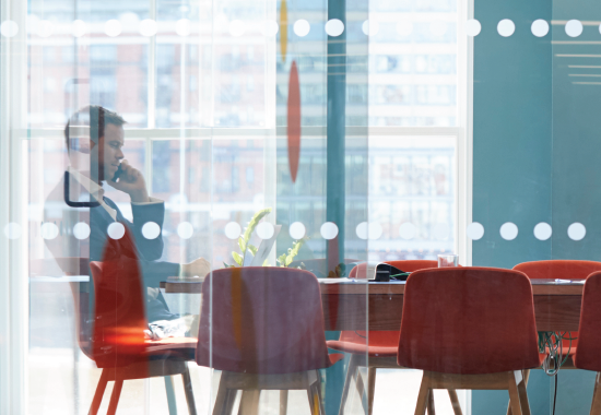 man in a conference room with rf blocking materials